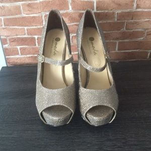 Sparkly gold high heels